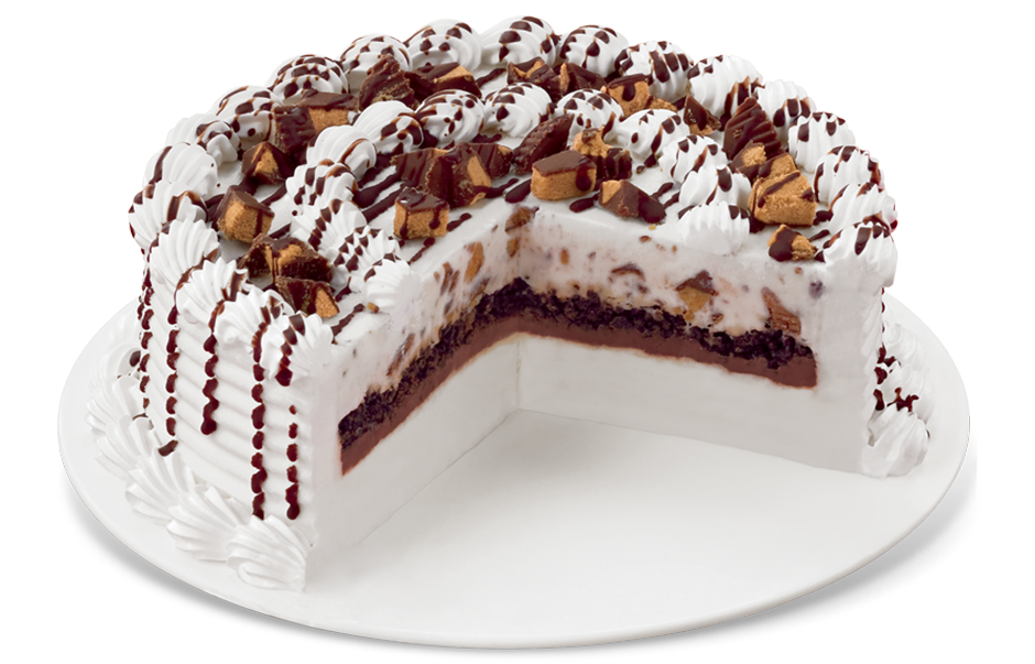 Peanut butter cup Blizzard cake with candy pieces and chocolate drizzle