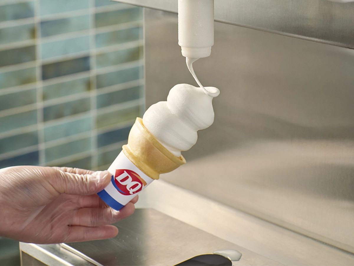 Soft serve being swirled into a cone